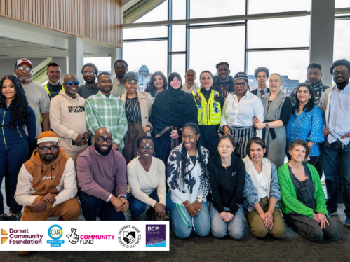 A picture of people from ethinically diverse communities gathered together at a networking event